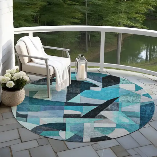8' Teal Blue Black Aqua And Turquoise Round Abstract Washable Indoor Outdoor Area Rug Photo 5