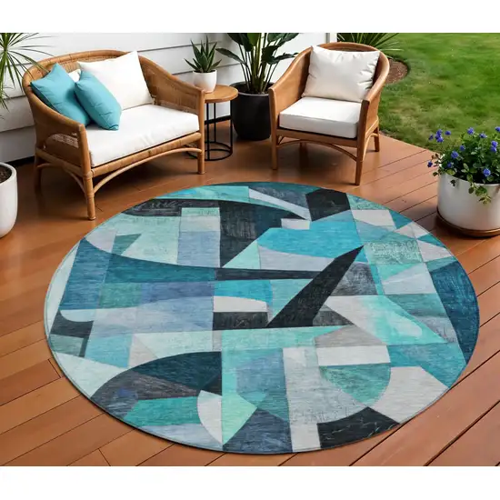 8' Teal Blue Black Aqua And Turquoise Round Abstract Washable Indoor Outdoor Area Rug Photo 2