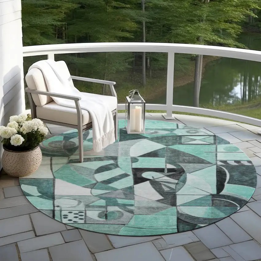8' Teal Blue Black Ivory And Gray Round Abstract Washable Indoor Outdoor Area Rug Photo 5