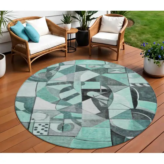 8' Teal Blue Black Ivory And Gray Round Abstract Washable Indoor Outdoor Area Rug Photo 2