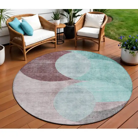 8' Teal Blue Brown And Beige Round Geometric Washable Indoor Outdoor Area Rug Photo 1