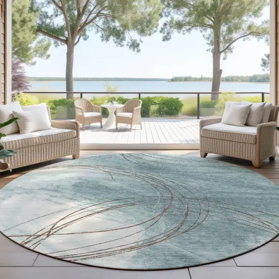8' Teal Blue Brown And Ivory Round Abstract Washable Indoor Outdoor Area Rug Photo 4