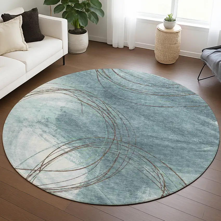 8' Teal Blue Brown And Ivory Round Abstract Washable Indoor Outdoor Area Rug Photo 5