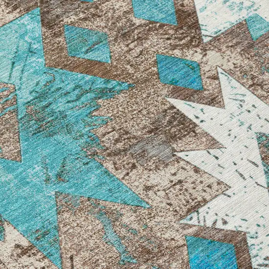 8' Teal Blue Brown And Ivory Round Aztec Washable Indoor Outdoor Area Rug Photo 9