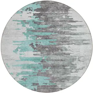 Photo of 8' Teal Blue Charcoal And Silver Round Abstract Washable Indoor Outdoor Area Rug
