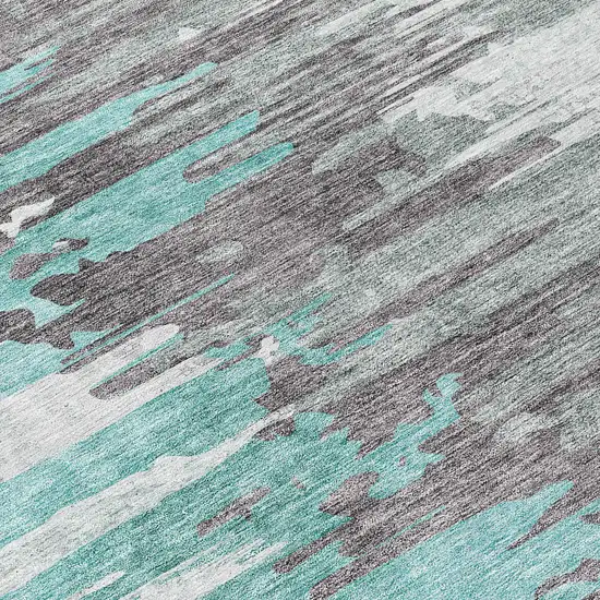 8' Teal Blue Charcoal And Silver Round Abstract Washable Indoor Outdoor Area Rug Photo 9