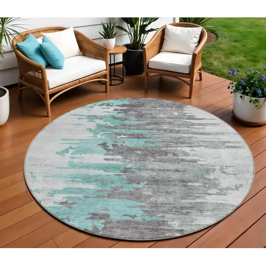 8' Teal Blue Charcoal And Silver Round Abstract Washable Indoor Outdoor Area Rug Photo 1