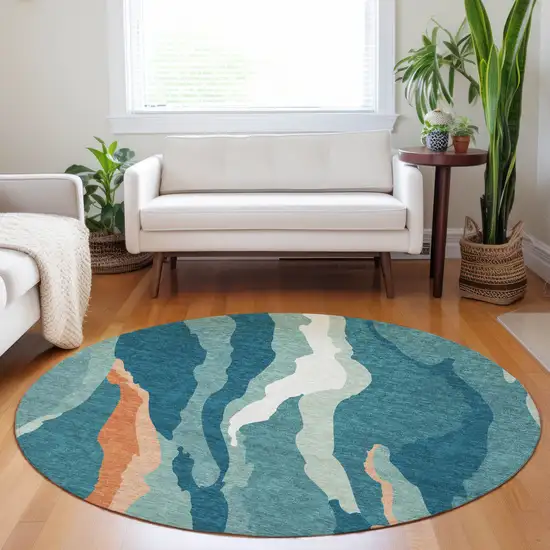 8' Teal Blue Copper And Ivory Round Abstract Washable Indoor Outdoor Area Rug Photo 9
