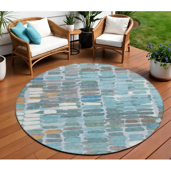 8' Teal Blue Copper And Ivory Round Abstract Washable Indoor Outdoor Area Rug Photo 1