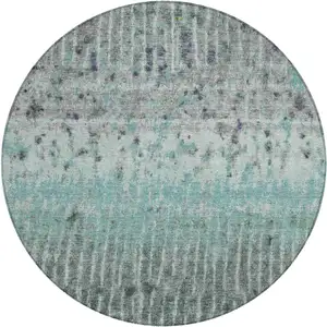 Photo of 8' Teal Blue Gold And Gray Round Abstract Washable Indoor Outdoor Area Rug
