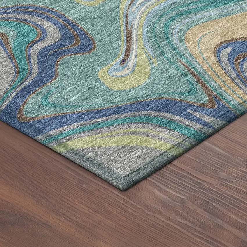 8' Teal Blue Gold And Ivory Round Abstract Washable Indoor Outdoor Area Rug Photo 8