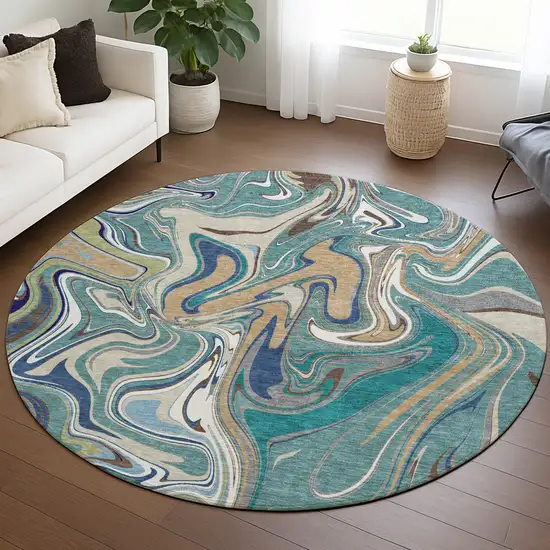 8' Teal Blue Gold And Ivory Round Abstract Washable Indoor Outdoor Area Rug Photo 5