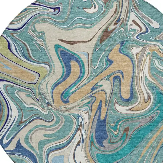 8' Teal Blue Gold And Ivory Round Abstract Washable Indoor Outdoor Area Rug Photo 2