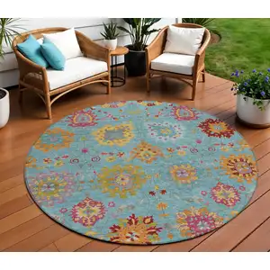 Photo of 8' Teal Blue Gold And Pink Round Damask Washable Indoor Outdoor Area Rug