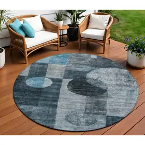 Photo of 8' Teal Blue Gray And Charcoal Round Geometric Washable Indoor Outdoor Area Rug