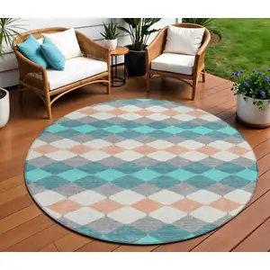 Photo of 8' Teal Blue Gray And Copper Round Geometric Washable Indoor Outdoor Area Rug