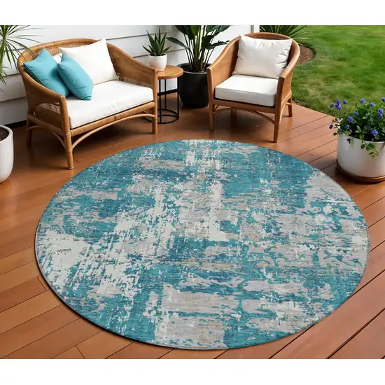 8' Teal Blue Gray And Ivory Round Abstract Washable Indoor Outdoor Area Rug Photo 1