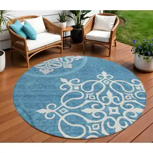 Photo of 8' Teal Blue Gray And Ivory Round Floral Medallion Washable Indoor Outdoor Area Rug