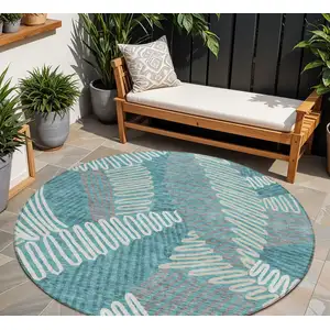 Photo of 8' Teal Blue Gray And Ivory Round Floral Washable Indoor Outdoor Area Rug