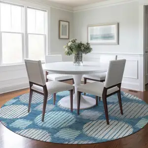 Photo of 8' Teal Blue Gray And Ivory Round Geometric Washable Indoor Outdoor Area Rug