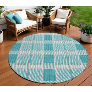 Photo of 8' Teal Blue Gray And Ivory Round Plaid Washable Indoor Outdoor Area Rug