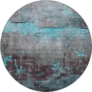 Photo of 8' Teal Blue Gray And Taupe Round Abstract Washable Indoor Outdoor Area Rug