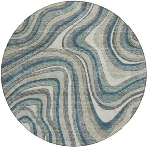 Photo of 8' Teal Blue Gray And Taupe Round Abstract Washable Indoor Outdoor Area Rug
