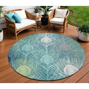 Photo of 8' Teal Blue Green And Ivory Round Floral Washable Indoor Outdoor Area Rug