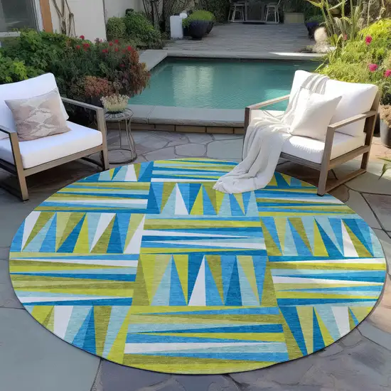 8' Teal Blue Green And Ivory Round Geometric Washable Indoor Outdoor Area Rug Photo 7