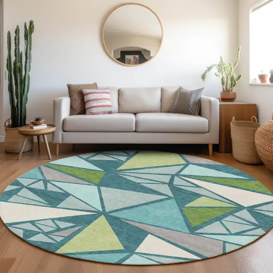 8' Teal Blue Green And Ivory Round Geometric Washable Indoor Outdoor Area Rug Photo 7
