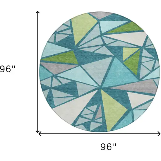 8' Teal Blue Green And Ivory Round Geometric Washable Indoor Outdoor Area Rug Photo 3