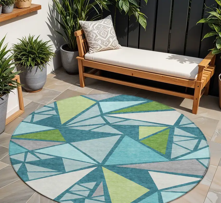 8' Teal Blue Green And Ivory Round Geometric Washable Indoor Outdoor Area Rug Photo 1