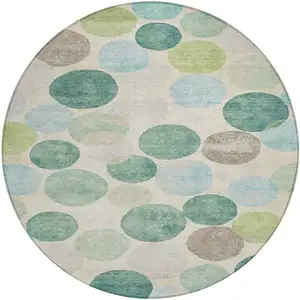 Photo of 8' Teal Blue Green And Ivory Round Geometric Washable Indoor Outdoor Area Rug