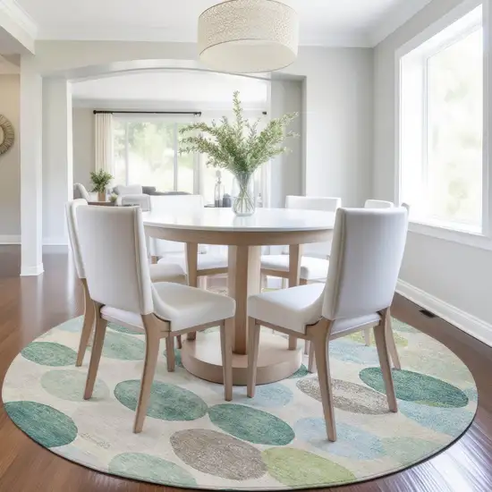 8' Teal Blue Green And Ivory Round Geometric Washable Indoor Outdoor Area Rug Photo 7