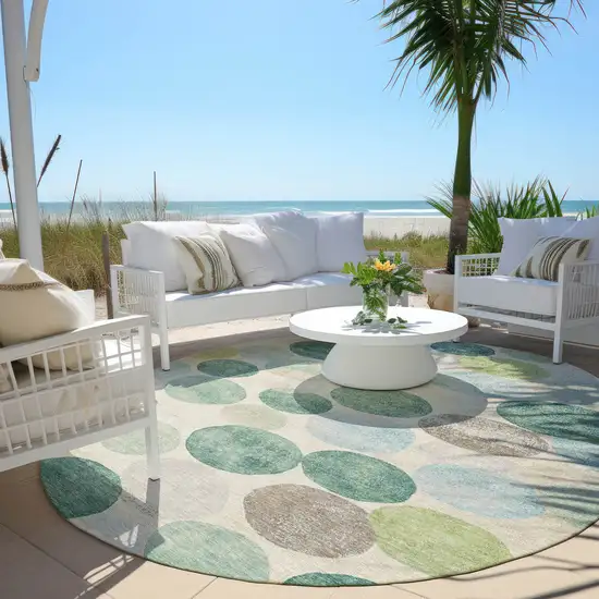 8' Teal Blue Green And Ivory Round Geometric Washable Indoor Outdoor Area Rug Photo 6