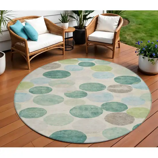 8' Teal Blue Green And Ivory Round Geometric Washable Indoor Outdoor Area Rug Photo 2
