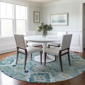 Photo of 8' Teal Blue Green And Ivory Round Oriental Washable Indoor Outdoor Area Rug
