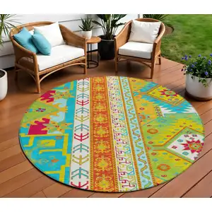 Photo of 8' Teal Blue Green And Pink Round Aztec Washable Indoor Outdoor Area Rug