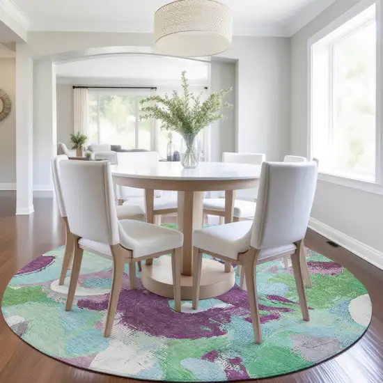 8' Teal Blue Green And Purple Round Abstract Washable Indoor Outdoor Area Rug Photo 6