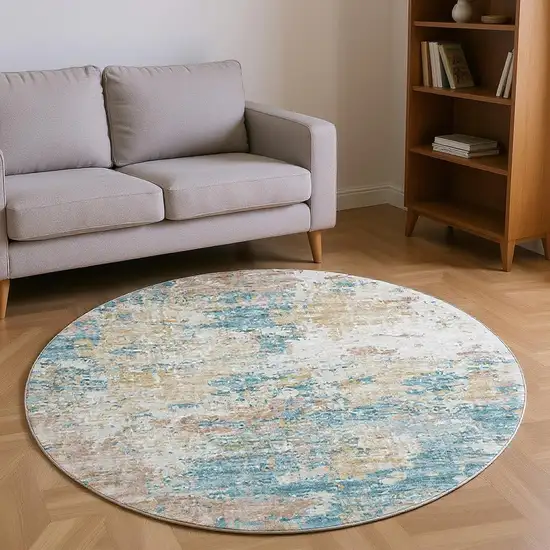 8' Teal Blue Ivory And Copper Abstract Washable Round Rug With UV Protection Photo 1