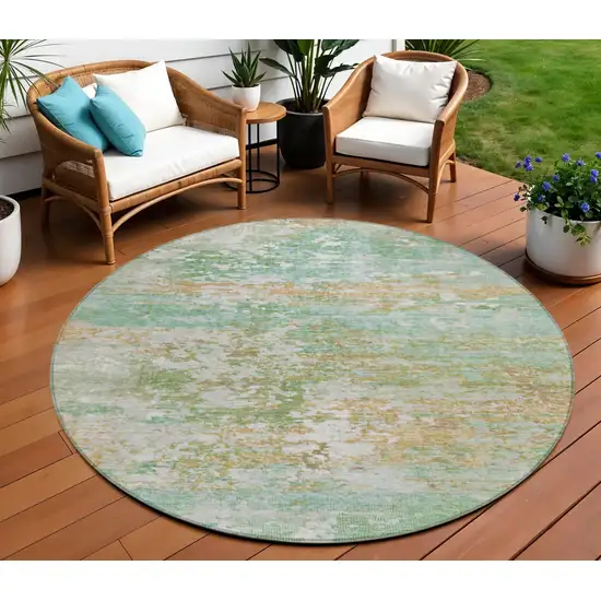 8' Teal Blue Ivory And Copper Round Abstract Washable Indoor Outdoor Area Rug Photo 2