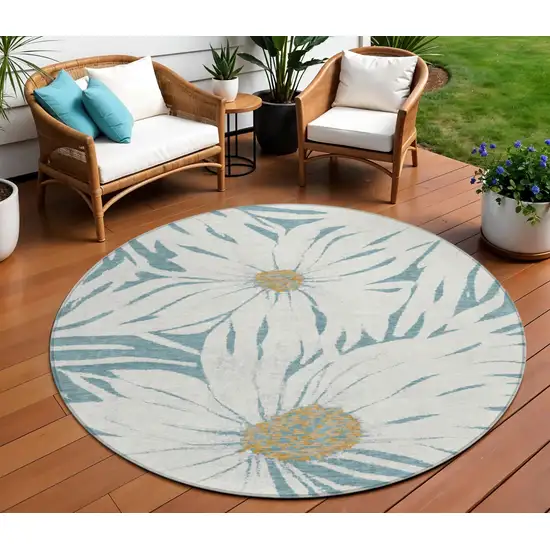8' Teal Blue Ivory And Gold Round Floral Washable Indoor Outdoor Area Rug Photo 1