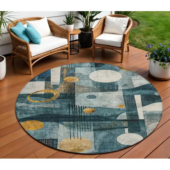 8' Teal Blue Ivory And Gold Round Geometric Washable Indoor Outdoor Area Rug Photo 1