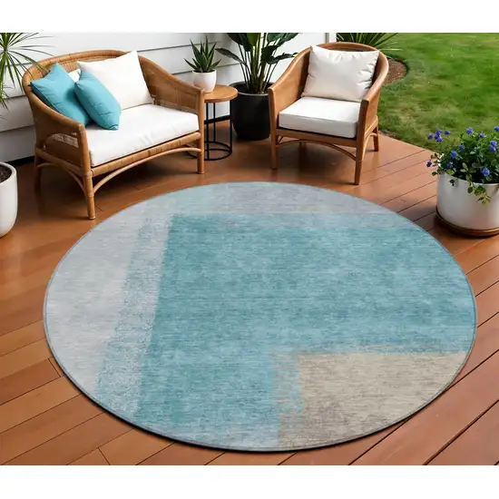 8' Teal Blue Ivory And Gray Round Abstract Washable Indoor Outdoor Area Rug Photo 1