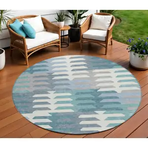 Photo of 8' Teal Blue Ivory And Gray Round Geometric Washable Indoor Outdoor Area Rug