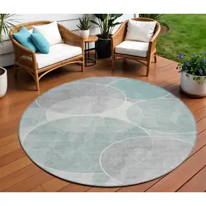 Photo of 8' Teal Blue Ivory And Gray Round Geometric Washable Indoor Outdoor Area Rug