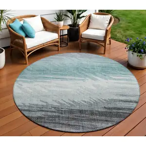 Photo of 8' Teal Blue Ivory And Gray Round Striped Washable Indoor Outdoor Area Rug