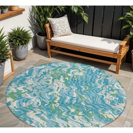 8' Teal Blue Ivory And Green Round Abstract Washable Indoor Outdoor Area Rug Photo 1