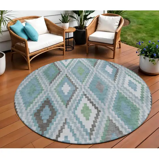 8' Teal Blue Ivory And Green Round Geometric Washable Indoor Outdoor Area Rug Photo 1
