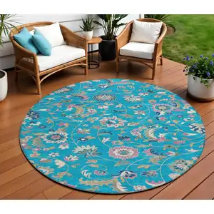 Photo of 8' Teal Blue Ivory And Pink Round Floral Washable Indoor Outdoor Area Rug